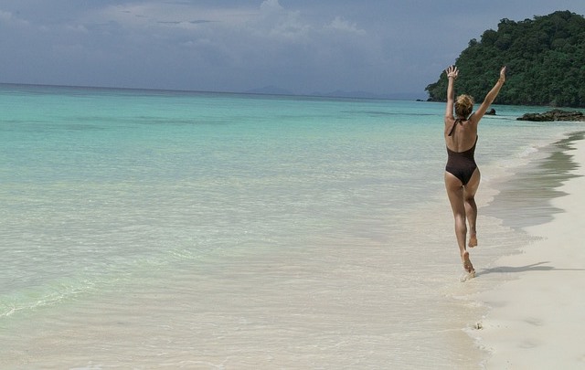 woman running on beach